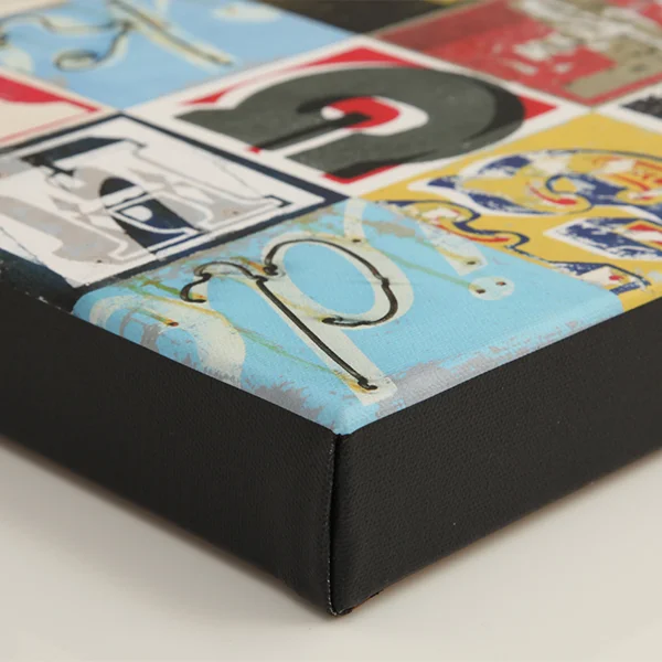 Black edge wrap over a 38mm European knotless pine frame, milled with a curved profile, minimising contact with the face of the canvas and preventing unsightly impression marks and surface cracking.