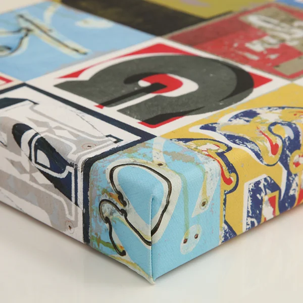 Image wrap edge over a 38mm European knotless pine frame, milled with a curved profile, minimising contact with the face of the canvas and preventing unsightly impression marks and surface cracking.