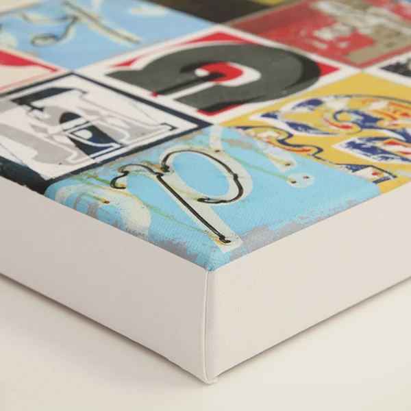 White edge wrap over a 38mm European knotless pine frame, milled with a curved profile, minimising contact with the face of the canvas and preventing unsightly impression marks and surface cracking.