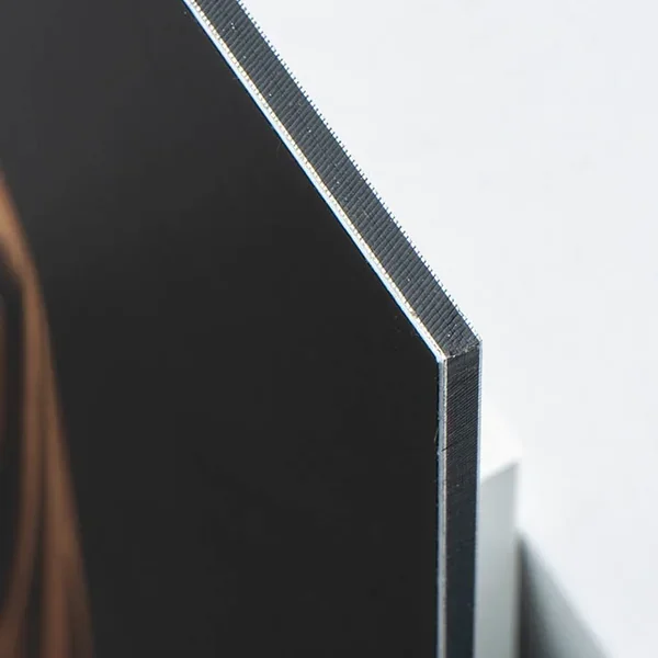 Aluminium Dibond is a lightweight composite of solid black PVC pressed between two aluminium sheets. Durable, rigid and beautifully flat.