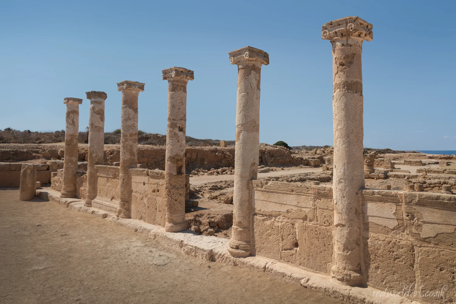 Framed Wall Art: A row of ancient stone columns taken at Archeological Site of Nea Paphos, Paphos, Cyprus 