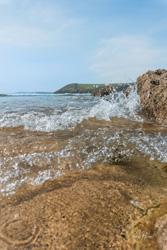 Manorbier Beach Waves Wall Art by Carol Herbert