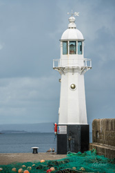 Mevagissey Lighthouse Wall Art by Carol Herbert